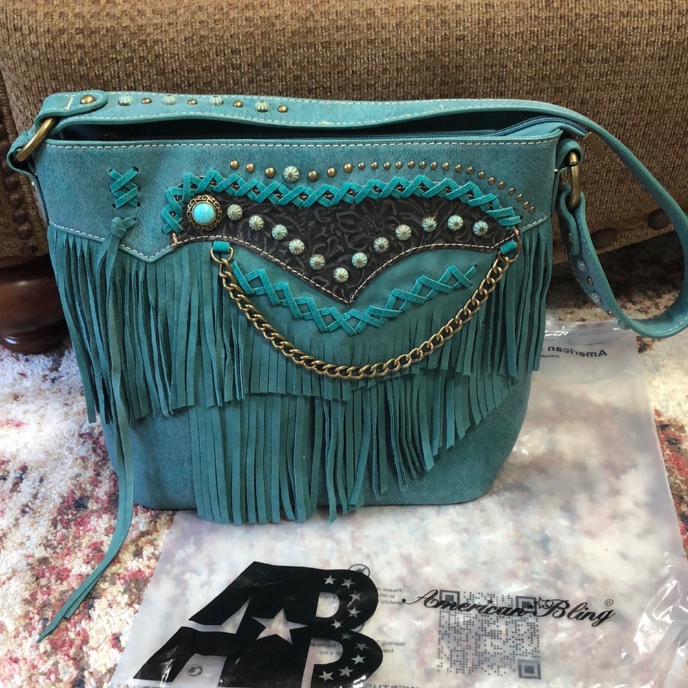 Montana west, American bling shoulder bag in Turquoise Faux Suede
